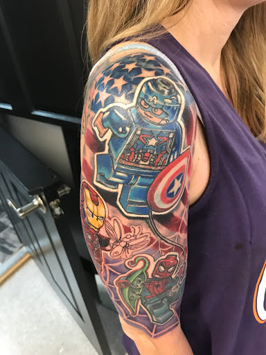 Explore inner bicep tattoo cover up ideas, creative tattoo ideas in Easley, available at Amber Island Tattoo