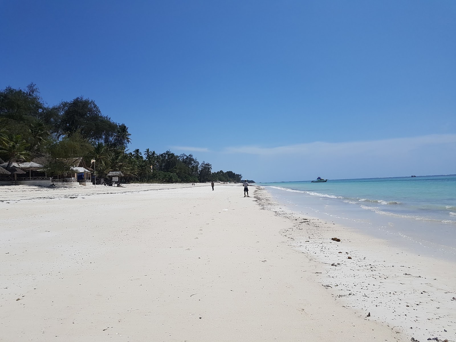 Photo of Trade Winds Beach with bright sand surface