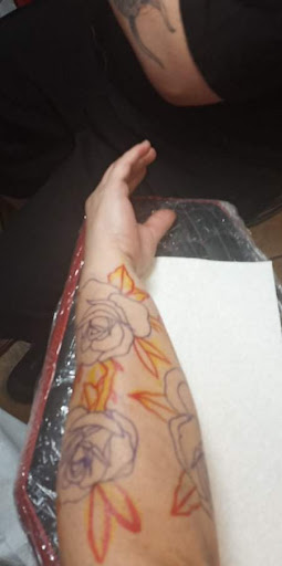 Explore feminine neck tattoo ideas, creative tattoo ideas in Fort Myers, available at Laid Back Tattoo