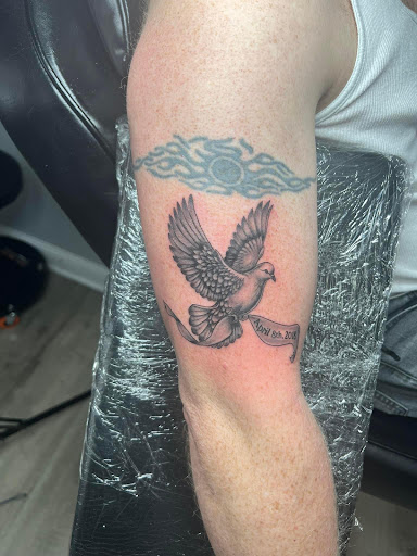 Explore icarus tattoo ideas, creative tattoo ideas in Kenosha, available at Kenosha Tattoo Company