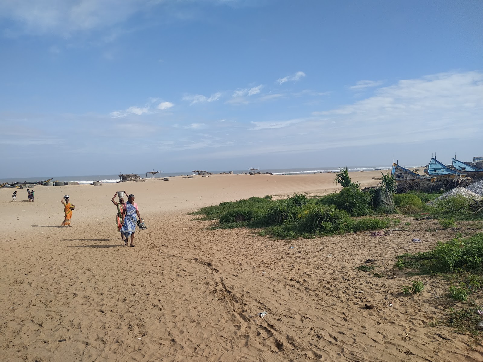 Kapasukuddi Beach的照片 带有明亮的沙子表面