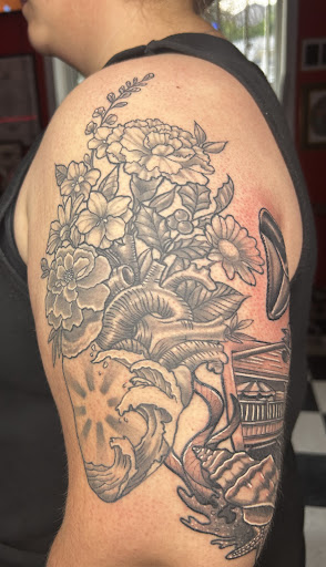 Explore belle tattoo ideas, creative tattoo ideas in Dunbar, available at Artistic Creations Tattoo
