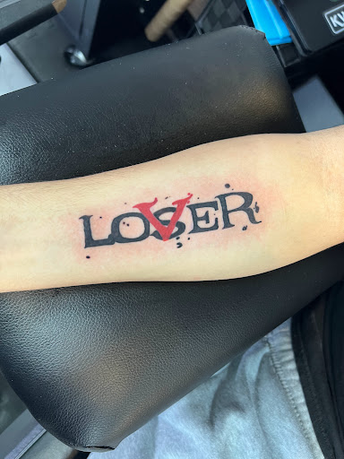 Explore football tattoo ideas, creative tattoo ideas in Raleigh, available at Underground Art