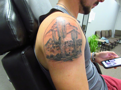 Explore memorial tattoo ideas for men, creative tattoo ideas in Hartford, available at Tat2s Inked & Restored