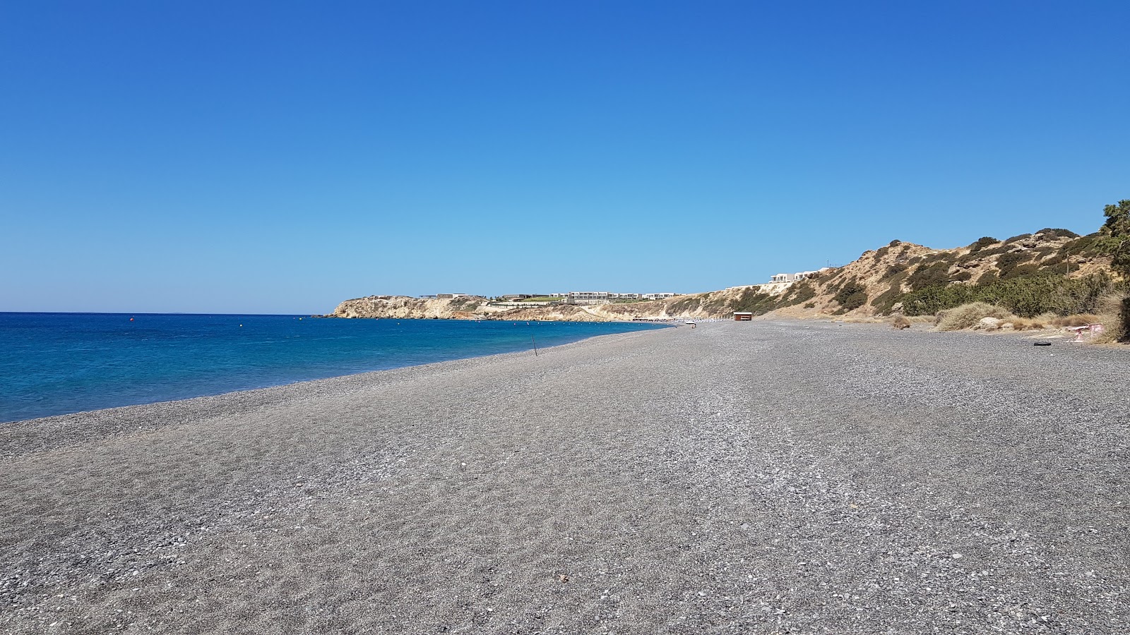 Foto av Koutsounari Long beach med grå fin sten yta