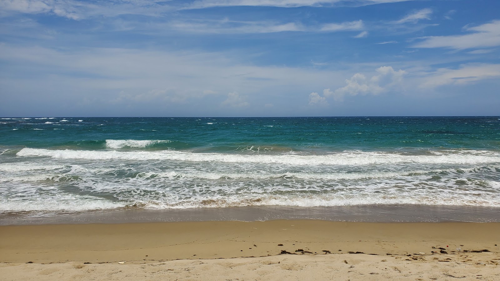 Valokuva Playa Guzmancitoista. pinnalla turkoosi vesi:n kanssa