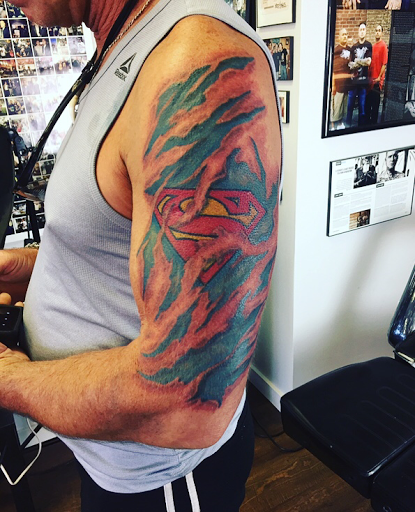 Explore red bird tattoo ideas, creative tattoo ideas in The Dalles, available at Cascade Tattoo Company (Hanks Family Tattoo)