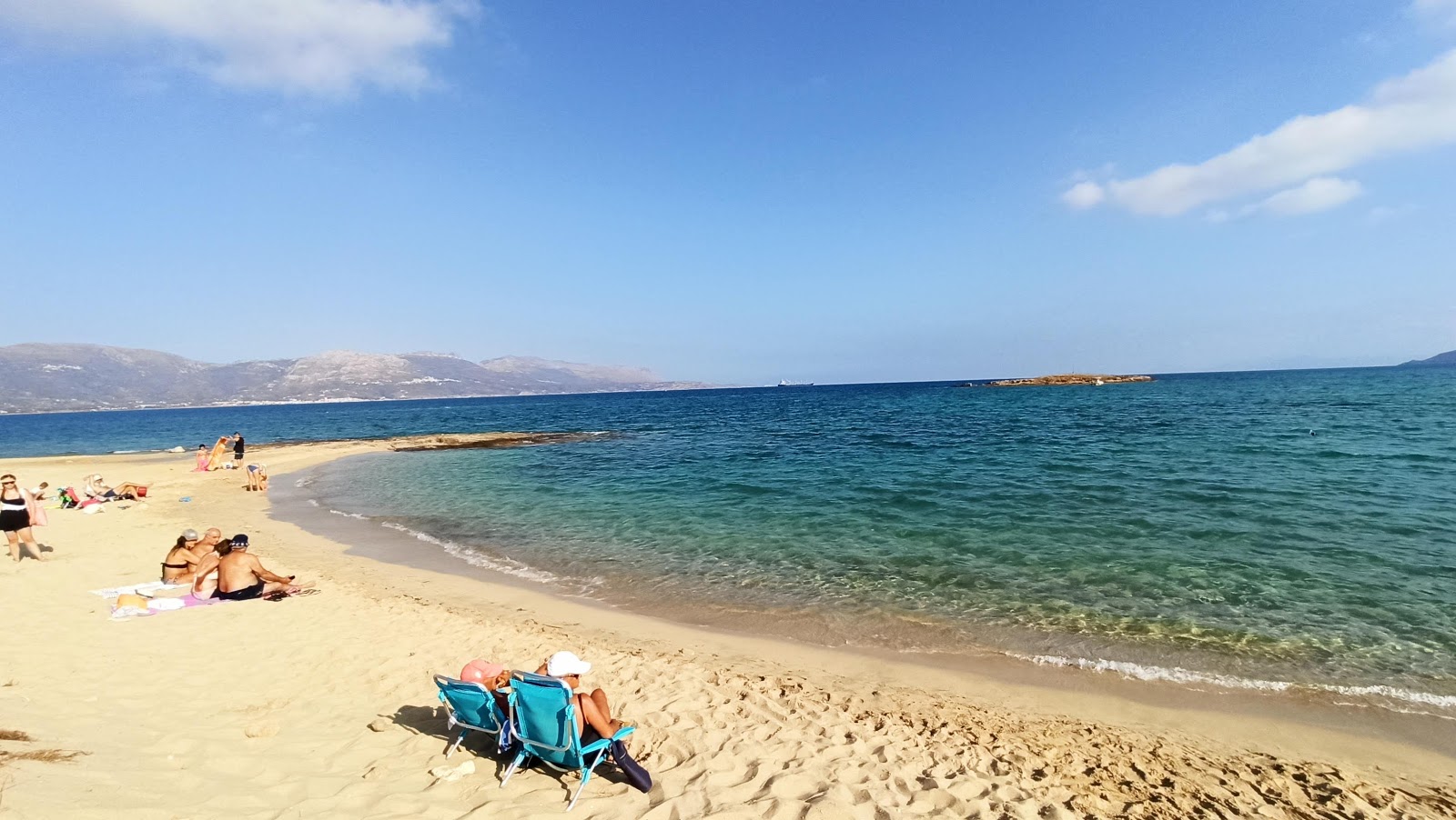 Foto van Pouda beach met helder fijn zand oppervlakte