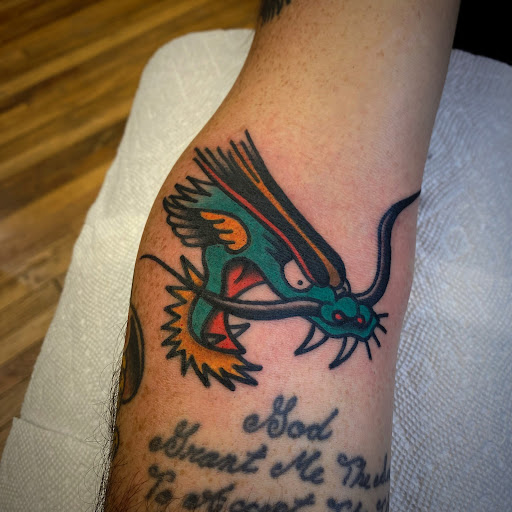Find gym tattoo ideas for men for your next unique tattoo in Glenside at Yellow Rose Tattoo