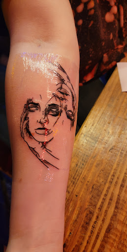 Explore inner ear tattoo ideas, creative tattoo ideas in Jonesboro, available at Gallery Of Ink Tattoo Shop