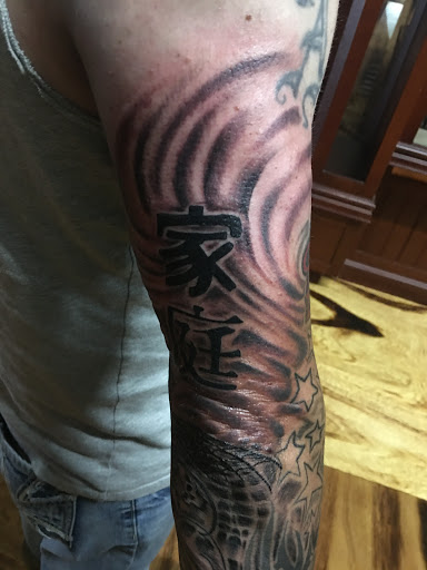 Explore chain link tattoo ideas, creative tattoo ideas in Peoria, available at Hot Spot Tattoo and Piercing