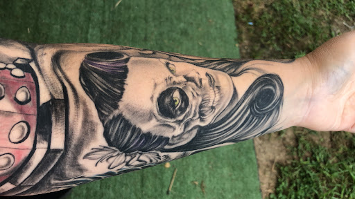 Explore name tattoo ideas on arm, creative tattoo ideas in Scottsboro, available at 5 Points Tattoo