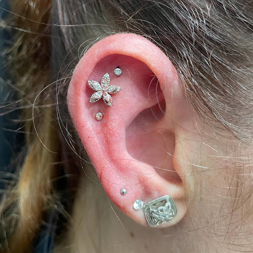 Explore strawberry tattoo ideas, creative tattoo ideas in Houston, available at Katy Piercing and Tattoo at Venetian