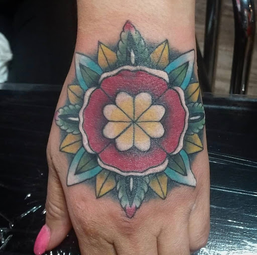 Explore rose name tattoo ideas, creative tattoo ideas in Lander, available at Blackblood Tattoo and Piercing