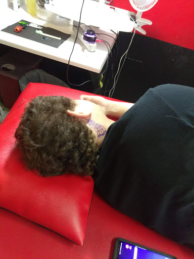 Tattoo Shop «Divine Torture», reviews and photos, 3223 Curry Ford Rd, Orlando, FL 32806, USA