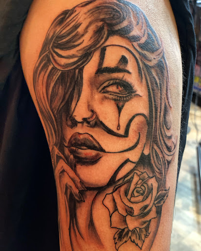 Explore cute spine tattoo ideas, creative tattoo ideas in Pikeville, available at The Carbon Canary Tattoo Studio