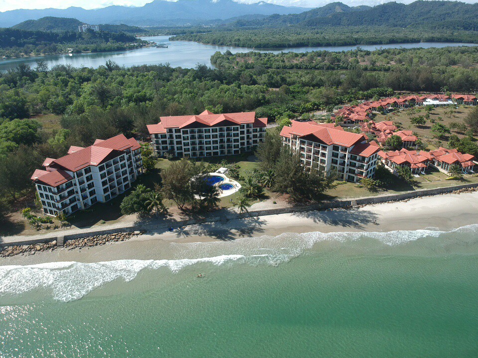 Fotografija Karambunai Beach in naselje