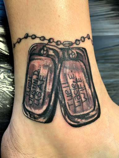 Find inner lip tattoo ideas for your next unique tattoo in Seymour at American Gypsy Tattoo Corp.