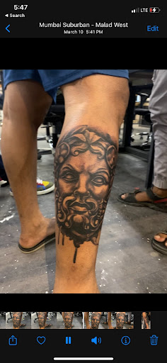 Explore script tattoo ideas for men, creative tattoo ideas in Atlanta, available at Iron Palm Tattoos & Body Piercing Atlanta