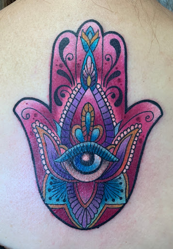 Explore grease tattoo ideas, creative tattoo ideas in Spring, available at Skin Stories Tat2