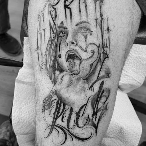 Explore men thigh tattoo ideas, creative tattoo ideas in Kalispell, available at Swindler Ink