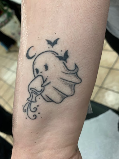 Explore haunted house tattoo ideas, creative tattoo ideas in Tampa, available at Angel Tattoo