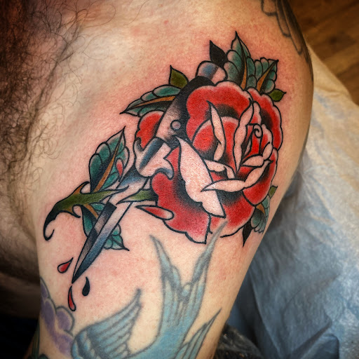 Explore finger word tattoos ideas, creative tattoo ideas in Winter Park, available at Overlook tattoo company