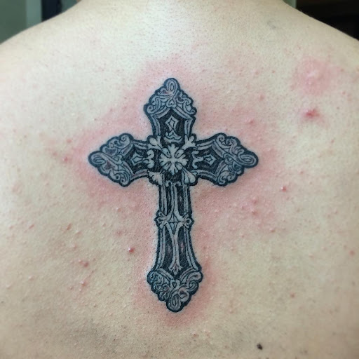 Explore tattoo ideas of strength, creative tattoo ideas in Stockton, available at Stockton Tattoo & Piercing