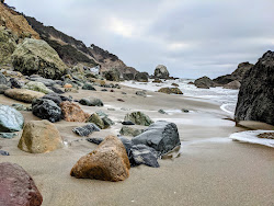 Mile Rock Beach'in fotoğrafı doğal alan içinde bulunmaktadır