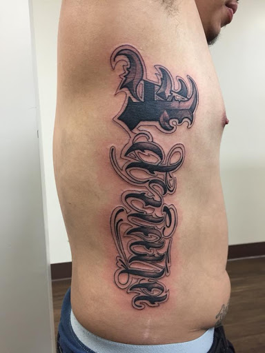 Explore tangled tattoo ideas, creative tattoo ideas in Lakeland, available at Lyons Den Tattoo Company