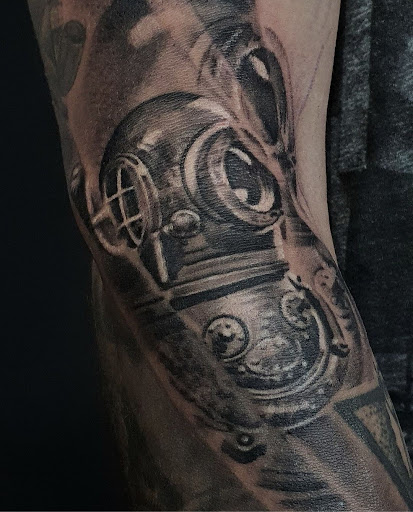 Explore packer tattoo ideas, creative tattoo ideas in Abington, available at Tattoo Galaxy (Abington) Piercing and Custom Tattoos