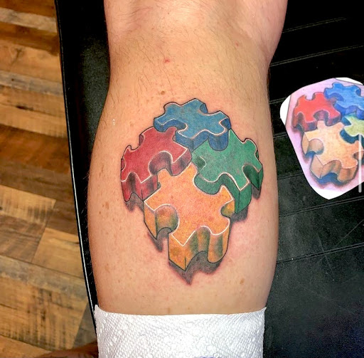 Explore feminine foot tattoo ideas, creative tattoo ideas in Davenport, available at Fine Ink Studios Tattoos