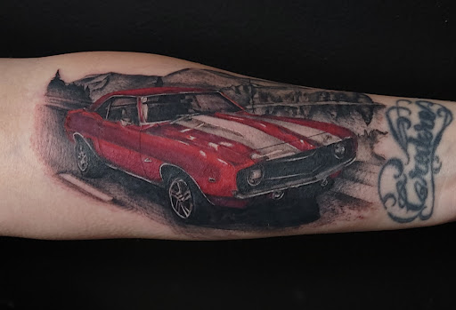 Explore themed sleeve tattoo ideas, creative tattoo ideas in Largo, available at Alchemy Tattoos and Body Piercings
