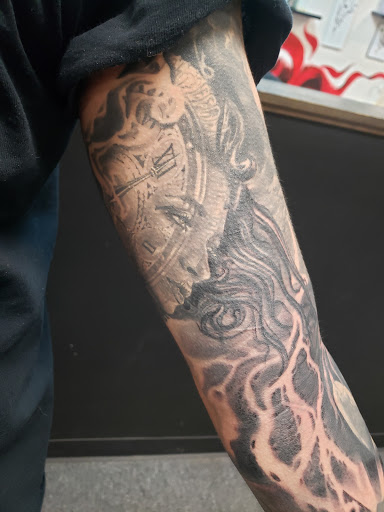 Explore tattoo cover up ideas for hand, creative tattoo ideas in Flint, available at Black Eye Social Club Tattoo