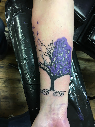 Explore forearm name tattoo ideas, creative tattoo ideas in Eureka Springs, available at Sailors Luck Tattoo