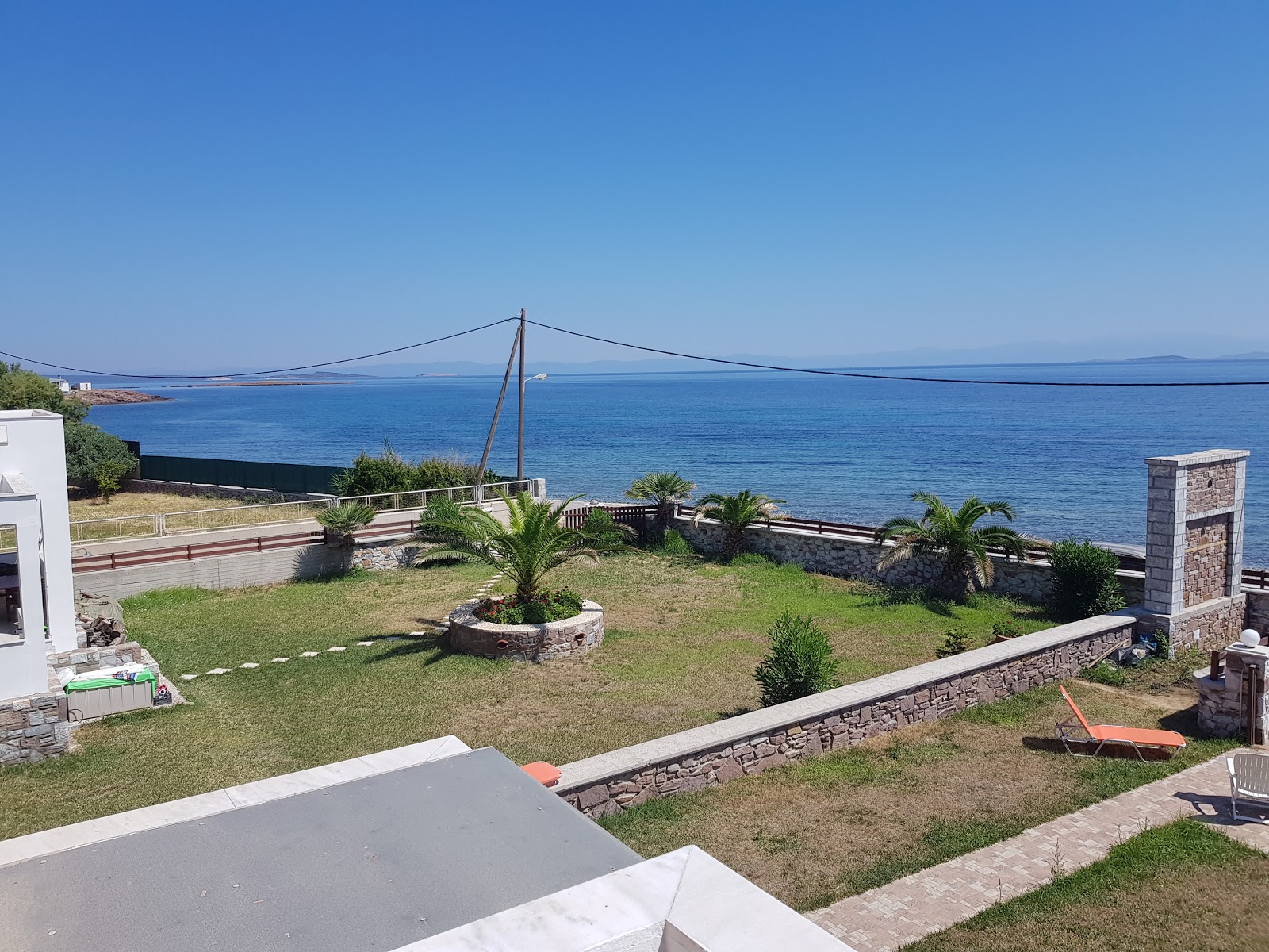 Foto af Toumpes beach - populært sted blandt afslapningskendere