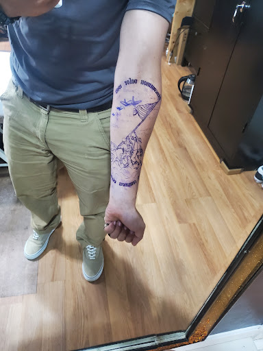 Find tattoos under the breast ideas for your next unique tattoo in West Chester at Liberty Bell Tattoo and Piercing