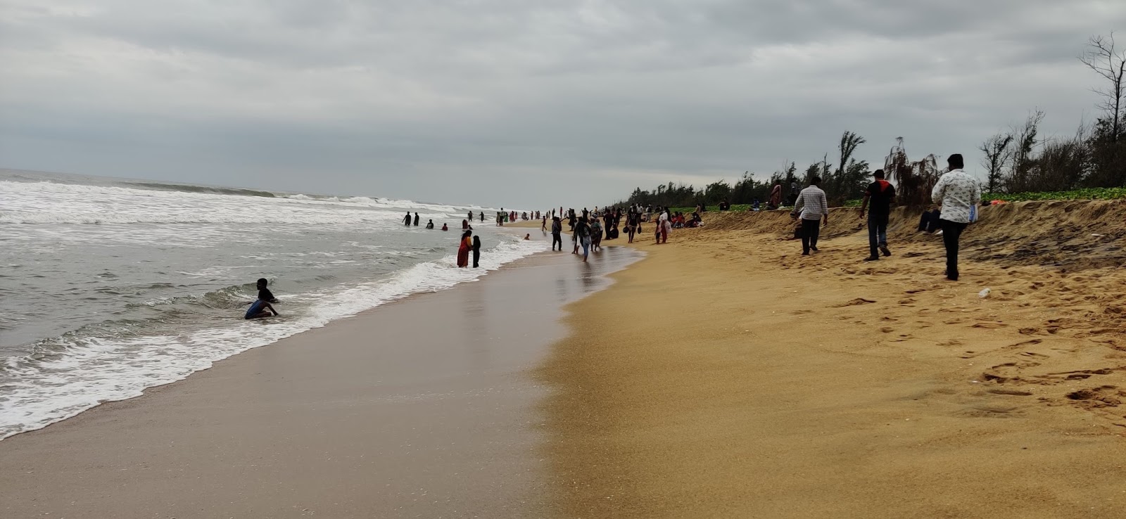 Fotografija Thiruvidanthai Beach z prostorna obala
