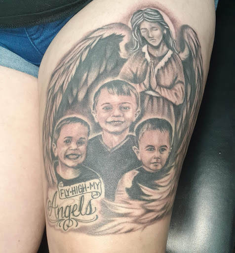 Find angels tattoos ideas for your next unique tattoo in Owosso at Expressions Body Art Studio