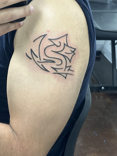 Explore mens sleeve tattoo ideas with meaning, creative tattoo ideas in Wisconsin Dells, available at Twisted Dimensions Tattoo Studio