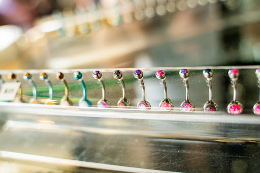 Explore cover up tattoo ideas for men, creative tattoo ideas in North Charleston, available at Exotic Impressions Body Piercing