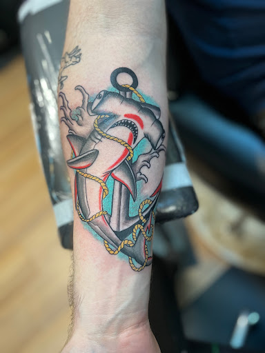 Explore blue flame tattoo ideas, creative tattoo ideas in Tarpon Springs, available at Legendary Custom Tattoos and Piercings