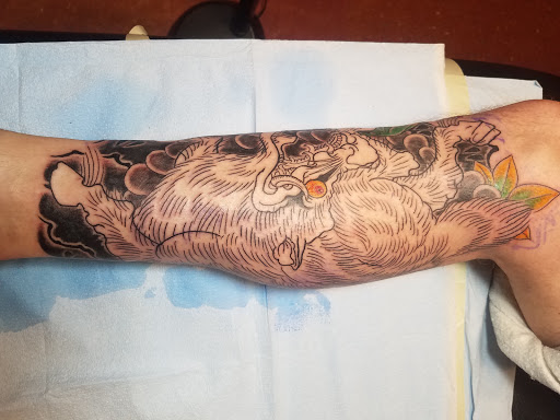 Explore tinkerbell tattoo ideas, creative tattoo ideas in Omaha, available at Liquid Courage Tattoos