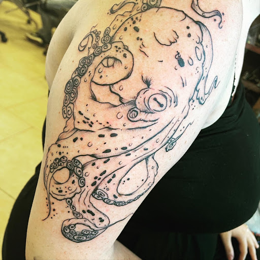 Explore 2 face tattoo ideas, creative tattoo ideas in Satellite Beach, available at Rocksteady Tattoo Company