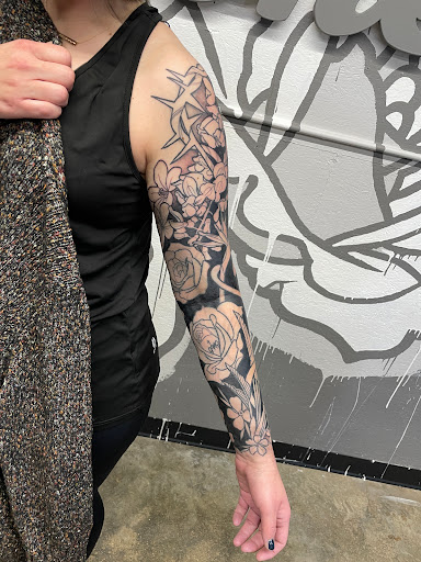 Explore skull sleeve tattoo ideas, creative tattoo ideas in Zumbrota, available at Art by Sinclair Tattoo Artist At Dry Bones Ink