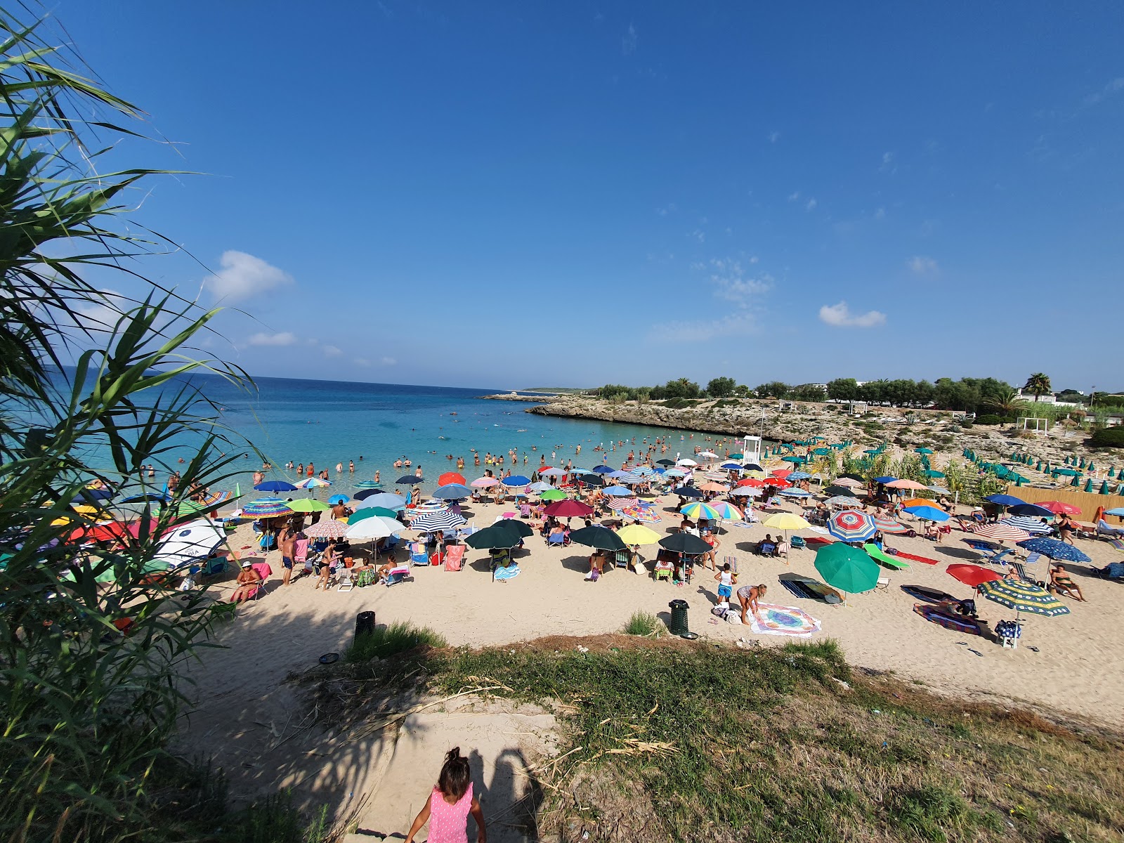 Fotografie cu Plaja Canneto cu mic golf