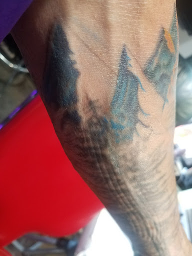 Explore helicopter tattoo ideas, creative tattoo ideas in Belleville, available at Integrity Tattoos