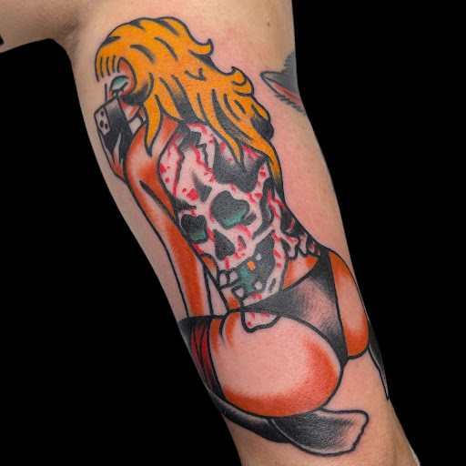 Explore pansy tattoo ideas, creative tattoo ideas in Johnson City, available at Gold Cross Tattoo Co.