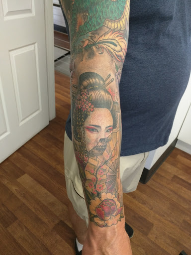 Tattoo Shop «North Main Tattoo Studio & Art Gallery», reviews and photos, 418 N Main St, Plymouth, MI 48170, USA