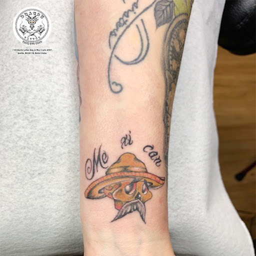 Explore saturn tattoo ideas, creative tattoo ideas in Seattle, available at Dragon Tattoo